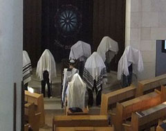 Kohanim performing Birkat Kohanim in a synagogue