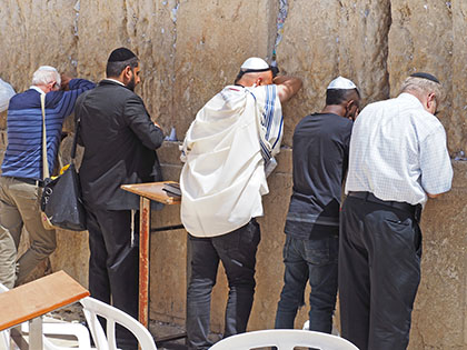 Men praying at the Kotel